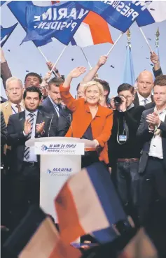 ??  ?? Marine Le Pen reacts at the end of a campaign rally in Paris. — Reuters photo