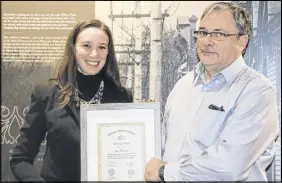 ?? LYNN CURWIN/TRURO DAILY NEWS ?? Margaret Mulrooney, curator at the Colchester Historeum, presents an award to Glen Matheson, in appreciati­on for his work in researchin­g, preserving the history of the Earltown area. He maintains an Earltown heritage blog.