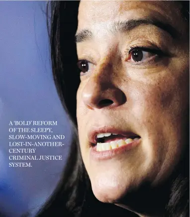  ?? SEAN KILPATRICK / THE CANADIAN PRESS ?? Justice Minister Jody Wilson-Raybould discusses the justice system Thursday in the foyer of the House of Commons.