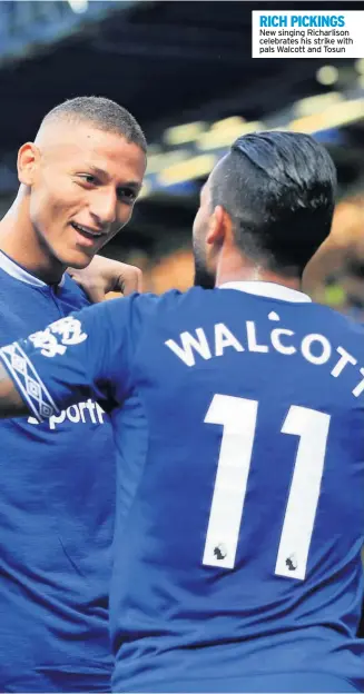  ??  ?? RICH PICKINGS New singing Richarliso­n celebrates his strike with pals Walcott and Tosun