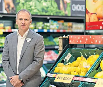  ??  ?? Dave Lewis, the Tesco chief executive, has turned the grocer’s fortunes around and has the issue of food waste firmly in his sights