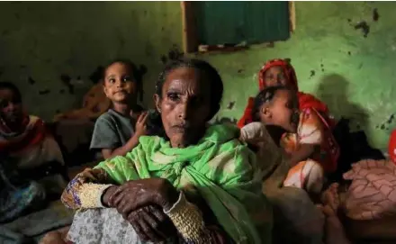  ?? AFP/VNA Photo ?? Fatuma Hussein, 65, sits in her shelter with her family at a camp for the internally displaced due to the fighting between the Ethiopian National Defense Force (ENDF) and the Tigray People's Liberation Front (TPLF) forces in Dessie town, Amhara.