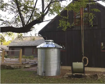  ??  ?? Metal cisterns can be an economical storage solution for water.