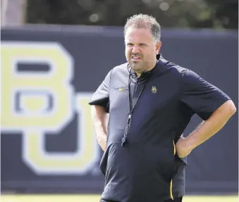  ?? JERRY LARSON/AP ?? After seeing Baylor go 1-11 in his first season in 2017, Matt Rhule guided the Bears to a 7-6 record capped by a bowl victory in 2018.