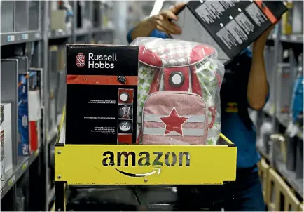  ?? PHOTO: REUTERS ?? New Zealand retailers are wondering what the arrival of Amazon in Australia will mean for them.