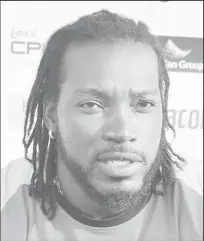  ??  ?? Big-hitting West Indies opener Chris Gayle was honoured by the UWI for his contributi­ons to cricket.