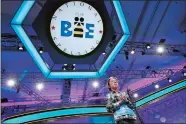  ?? JACQUELYN MARTIN/AP PHOTO/FILE ?? In this May 31, 2018, file photo, Lauren Guo, 12, from Arvada, Colo., competes in the Scripps National Spelling Bee in Oxon Hill, Md. An unremarkab­le sound can be the toughest thing for spellers to master at the Scripps National Spelling Bee. It’s known as the schwa. It sounds like “Uh,” and any vowel can make the sound. Spellers have a variety of techniques to figure out unfamiliar schwas, but none of the strategies is foolproof, and sometimes the only things to do are to memorize the word or guess.