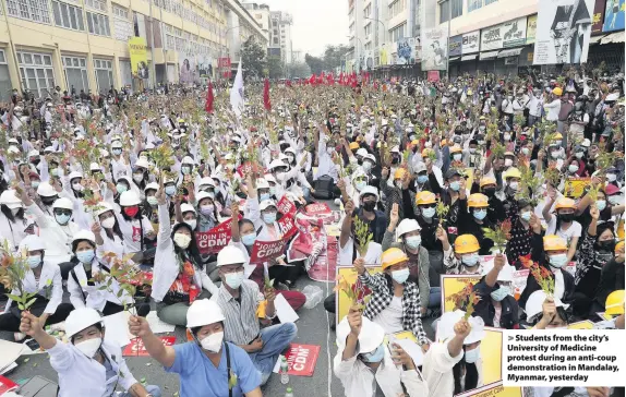  ??  ?? Students from the city’s University of Medicine protest during an anti-coup demonstrat­ion in Mandalay, Myanmar, yesterday