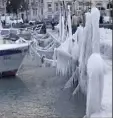  ?? (Photo EPA) ?? Les rives du lac Léman à Genève ont pris, hier, des allures féeriques après les fortes rafales de vent soufflant des vagues d’eau.