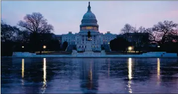  ?? ASSOCIATED PRESS ?? THE CAPITOL DOME OF THE CAPITOL BUILDING is seen at sunrise on Feb. 9 in Washington.