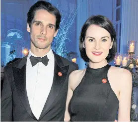  ?? Picture: DAVE BENETT ?? Michelle Dockery with beau John Dineen at a charity event last year