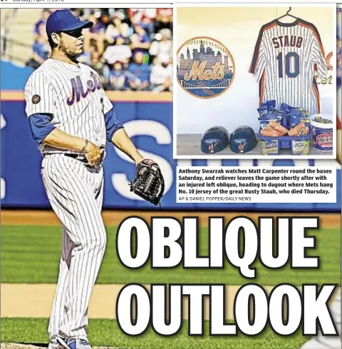  ??  ?? Anthony Swarzak watches Matt Carpenter round the bases Saturday, and reliever leaves the game shortly after with an injured left oblique, heading to dugout where Mets hang No. 10 jersey of the great Rusty Staub, who died Thursday.