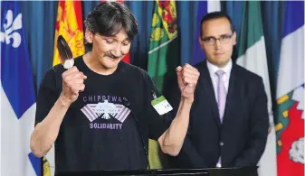  ??  ?? Jerry Natanine, community leader and former mayor of Clyde River, speaks at a news conference on Parliament Hill following a ruling at the Supreme Court of Canada in Ottawa.