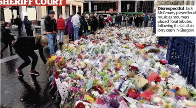  ??  ?? Disrespect­ful Jack McGroarty played loud music as mourners placed floral tributes, following the fatal bin lorry crash in Glasgow