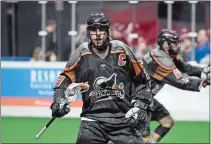  ?? PHOTO COURTESY OF MOHEGAN SUN ?? New England Black Wolves defenseman Brett Manney plays in a recent National Lacrosse League game at Mohegan Sun Arena.