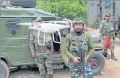  ?? ANI ?? Security personnel with a drone near the encounter site in Shopian ■ on Wednesday.