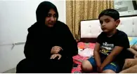  ??  ?? Sana Ghouse with her three-year-old son Amaan, who is yet to utter a word, at her room in Abu Dhabi.