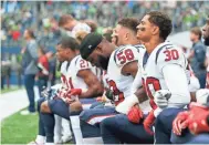  ?? JOE NICHOLSON, USA TODAY SPORTS ?? Houston Texans players kneel during the national anthem Sunday.