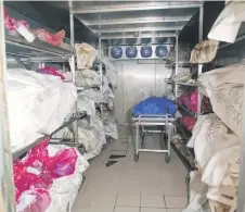  ?? ?? View of bags with corpses or human remains inside a cold room of the morgue at the Forensic Medical Service.