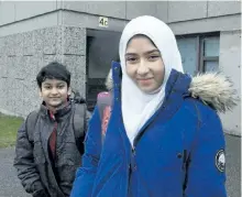  ?? STAN BEHAL/POSTMEDIA NETWORK ?? Khawlah Noman and her brother Mohammad Zakarijja leave school after they appeared before the media with their mom Saima Samad, to talk about the assault that happened to Khawlah on their way to Pauline Johnson Public School in Toronto this morning. A...