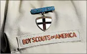  ?? TONY GUTIERREZ/AP 2013 ?? The Boy Scouts of America is suffering financiall­y from sex-abuse litigation and declining membership.