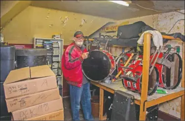  ?? Ives stands with drums at the Archer-Epler VFW Post. ??