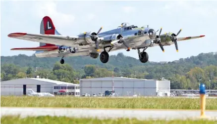  ?? STAFF PHOTOS BY ERIN O. SMITH ?? The Madras Maiden, a Boeing B-17G, takes off Monday at the Chattanoog­a Metropolit­an Airport Wilson Air Center. Public flights and ground tours will be available Saturday and Sunday.