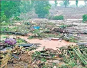  ?? AFP ?? The debris from the houses that came under a landslide in Taliye village in Maharashtr­a on Friday.