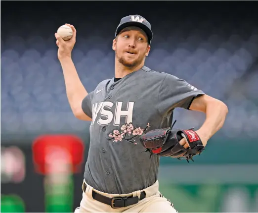  ?? NICK WASS/AP ?? Former Nationals right-hander Erick Fedde was the MVP of the Korean Baseball Organizati­on in 2023 after going 20-6 with a 2.00 ERA.