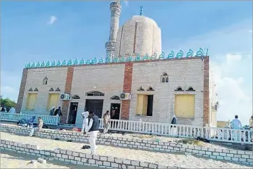  ?? AFP/Getty Images ?? THE DEATH TOLL in the Rawda mosque attack rose to more than 300 people, Egyptian authoritie­s say. Between 25 and 30 gunmen attacked the mosque in the North Sinai town of Bir Abed during Friday prayers.