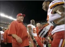  ?? THE ASSOCIATED PRESS FILE ?? First-year Kansas City Chiefs coach Andy Reid is a big, happy man after being doused on the sideline as the clock ticks down on a 26-16 Chiefs win over Reid’s old Eagles team Sept. 19, 2013 at Lincoln Financial Field.