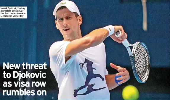  ?? The Rod Laver Arena in Melbourne yesterday ?? Novak Djokovic during a practice session at