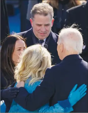  ?? (File Photo/AP/Carolyn Kaster) ?? Hunter Biden (top center) stands Jan. 20, 2021, with President Joe Biden, first lady Jill Biden and Ashley Biden after Joe Biden was sworn-in during the 59th Presidenti­al Inaugurati­on at the U.S. Capitol in Washington.