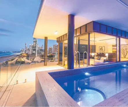  ??  ?? The two-storey penthouse at 3533 Main Beach Pde exudes opulance inside and out.