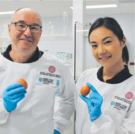  ??  ?? GOOD EGGS: James Cook University Professor Andreas Lopata and adjunct senior research fellow Aya Taki from the Australian Institute of Tropical Health and Medicine at work on vaccines for food allergies. JCU has been rated highly for its research.