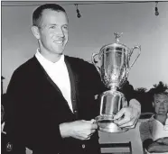  ?? AP PHOTO/FILE ?? In this June 17, 1961, file photo, Gene Littler holds the trophy after winning the U.S. Open golf tournament in Birmingham, Mich.