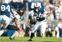  ?? BARRY REEGER/AP ?? Penn State running back Keyvone Lee, shown against Ball State in 2021, announced Friday night that he has placed his name in the NCAA transfer portal.