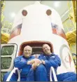  ??  ?? Russian cosmonaut Fyodor Yurchikhin (left), and NASA astronaut Jack David Fischer pose in front of the Soyuz MS-04 nose cone in an assembling department at the Russian-leased Baikonur cosmodrome in Kazakhstan on April 14. The crew is scheduled to blast...