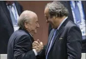  ?? PATRICK B. KRAEMER — AP FILE ?? Sepp Blatter, left, and Michel Platini, right, greet one another in 2015. They will enter a criminal court Wednesday charged with defrauding world soccer body FIFA. It’s an 11-day trial of two men once the most powerful in the world’s favorite sport.