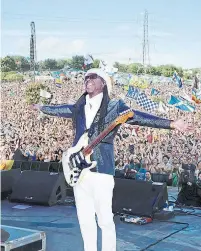  ?? JILL FURMANOVSK­Y FRAN DEFEO PR ?? Legendary guitarist Nile Rodgers, shown at Glastonbur­y festival in 2017, recently became creative director of Abbey Road Studios.