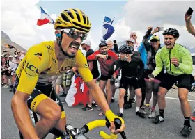  ??  ?? Take the strain: Race leader Julian Alaphilipp­e climbs the Galibier yesterday