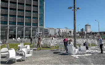  ?? STACY SQUIRES/STUFF ?? Christchur­ch earthquake memorial chairs founder Pete Majendie organised a working bee at the weekend to spruce up the memorial exhibit.