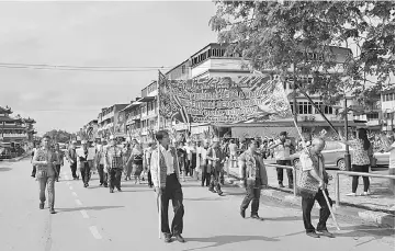  ??  ?? A section of the Gawai parade participan­ts yesterday.