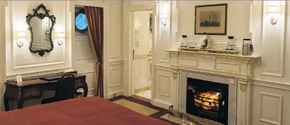  ?? AARON SAUNDERS ?? Eight of the 32 staterooms on the Sea Cloud have been restored, including two jaw-dropping luxury owner’s suites — one with a faux marble fireplace.