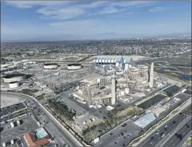  ?? Allen J. Schaben Los Angeles Times ?? EXPERTS WARN that the desalinati­on plant could harm the ecosystem. Above, the proposed plant’s site, which includes the Huntington Beach Energy Project.