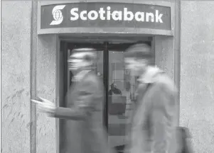  ?? CP PHOTO ?? A branch of Scotiabank is pictured in downtown Toronto last month.