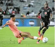  ?? Picture: SYDNEY SESHIBEDI/GALLO IMAGES ?? CLOSE ENCOUNTER: Souaibou Marou of Orlando Piratea and Kegan Johannes of SuperSport United in action during their DStv Premiershi­p match at Orlando Stadium in Soweto last year
