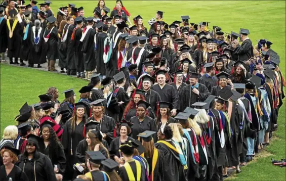  ?? SUBMITTED PHOTO — MONTGOMERY COUNTY COMMUNITY COLLEGE ?? Montgomery County Community College holds its commenceme­nt ceremony May 17.