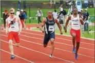 ??  ?? Penn State’s Xavier Smith runs to a second place finish in the men’s 100 meter dash final at the 2017 Big Ten Outdoor Track & Field Championsh­ips on May 14, 2017.