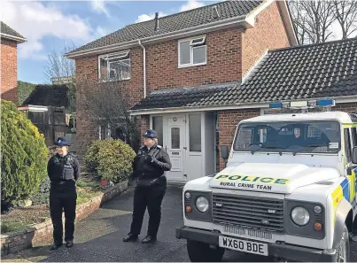  ??  ?? Police community support officers at the Salisbury home of Sergei Skripal where he and his daughter were poisoned by a substance on their door handles. Picture: PA.